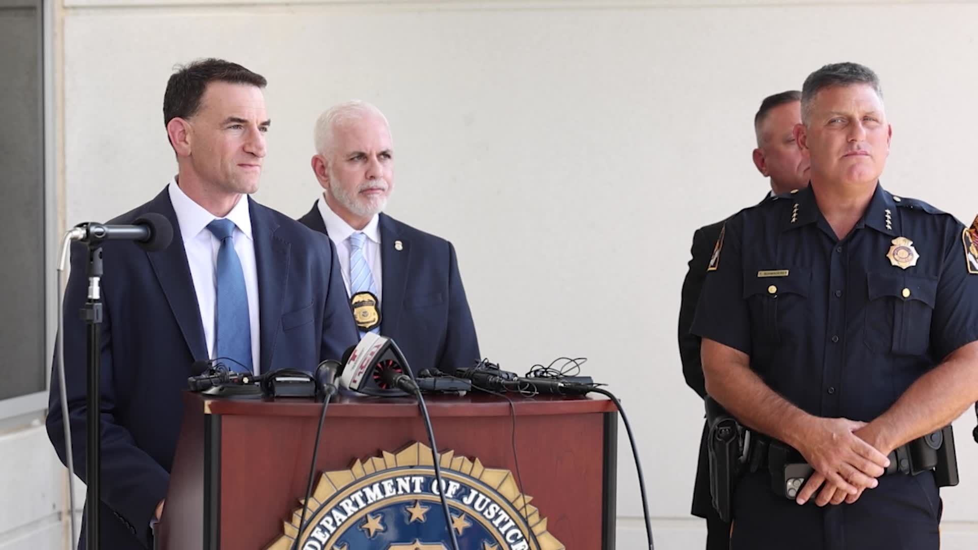 Federal and local law enforcement take questions at press conference after operations at multiple Omaha-area sites